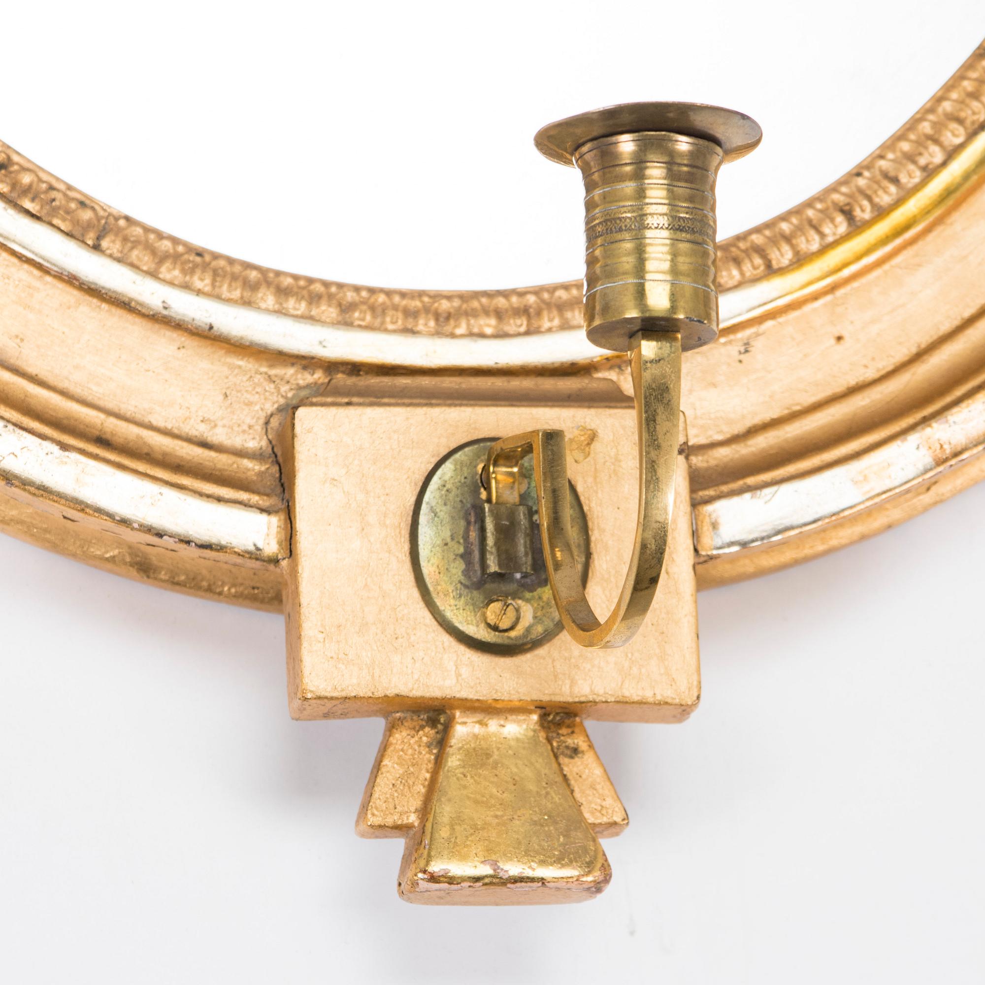 A Swedish Gustavian mirror wall lamp, late 18th century.