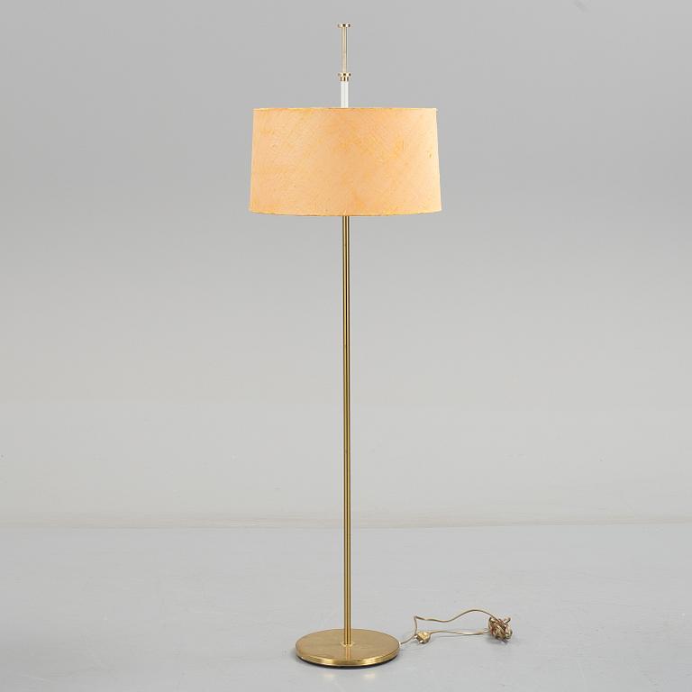 A 1960s brass floor light.