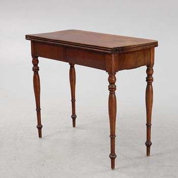 A mahogany games table, mid 19th Century.