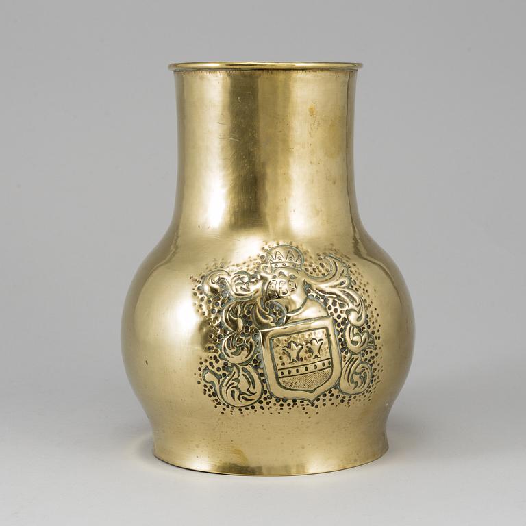 A 19th century brass champagne cooler.