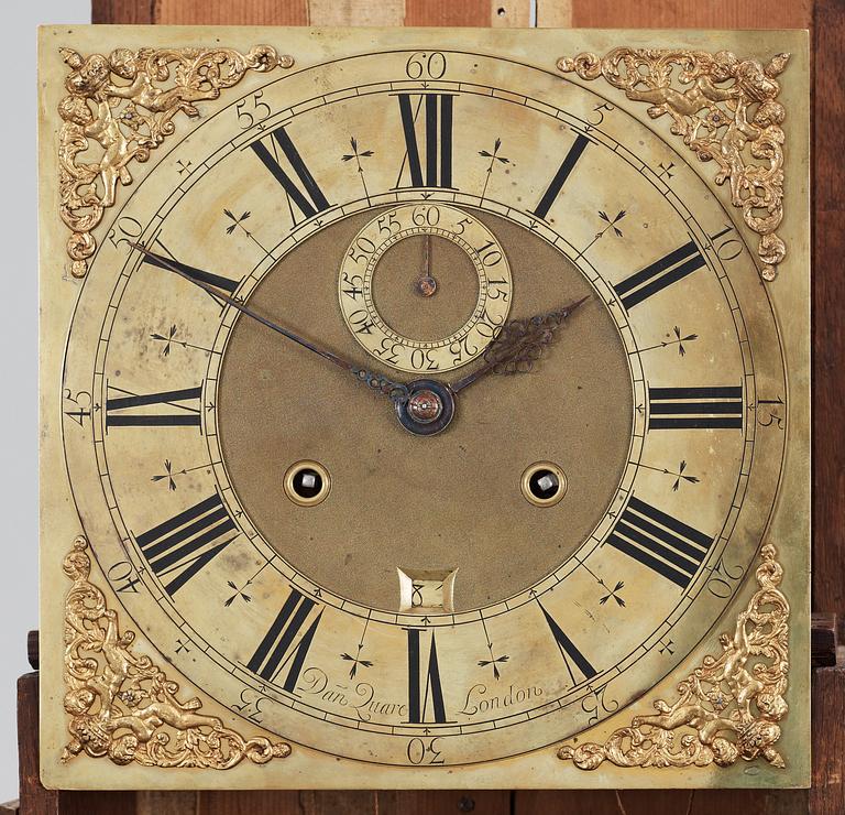 A Queen Anne walnut month-going longcase clock by Daniel Quare, London early 18th Century.