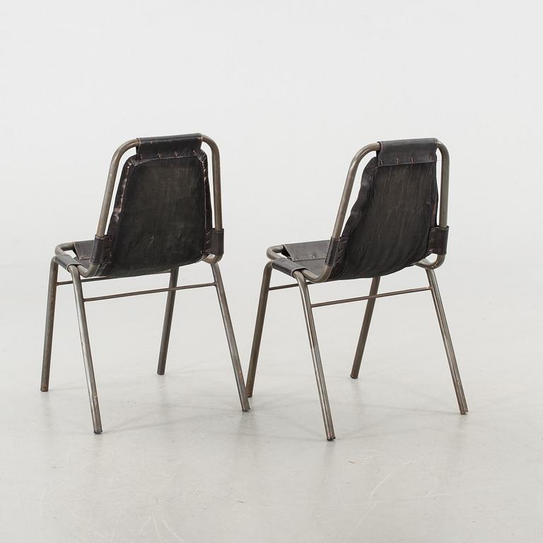 A COUPLE OF CHAIRS.