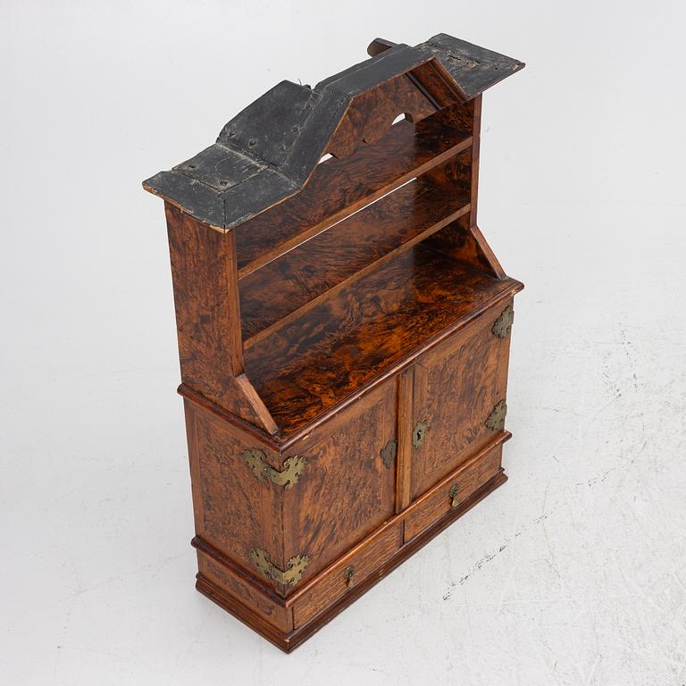 A late Baroque wall cabinet with shelves, first half of the 18th century.