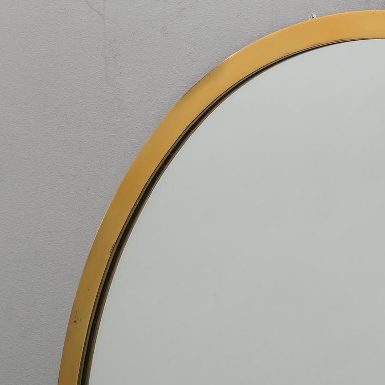 A 20th century brass mirror.