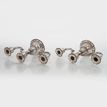 Carl M. Cohr, a pair of silver candelabra, Fredericia, Denmark, 1940.