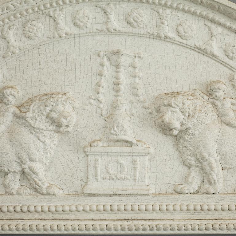 A late Gustavian carved and gesso crest, circa 1800.