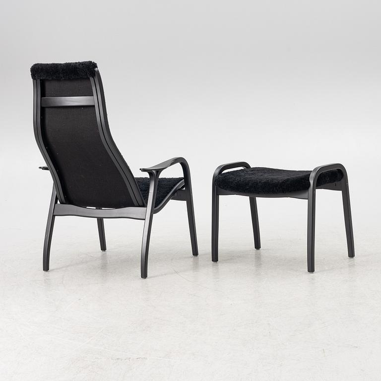 Yngve Ekström, a  'Lamino' easy chair with foot stool, Swedese, 2018.