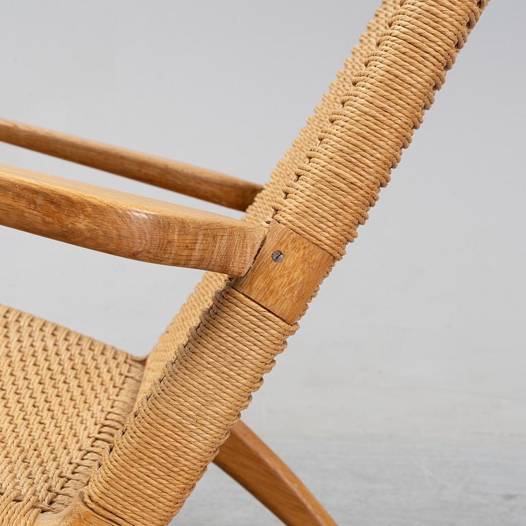 A 'CH-25' armchair designed by Hans J Wegner for Carl Hansen & Søn, Denmark.