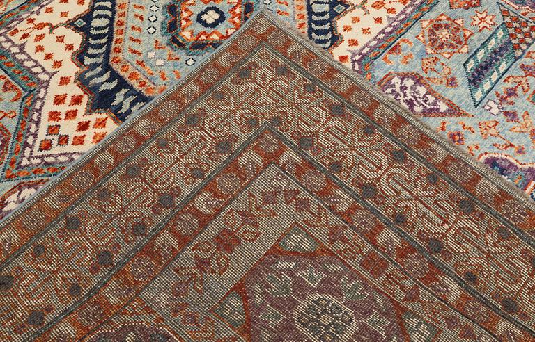 An Oriental carpet, c. 296 x 249 cm.