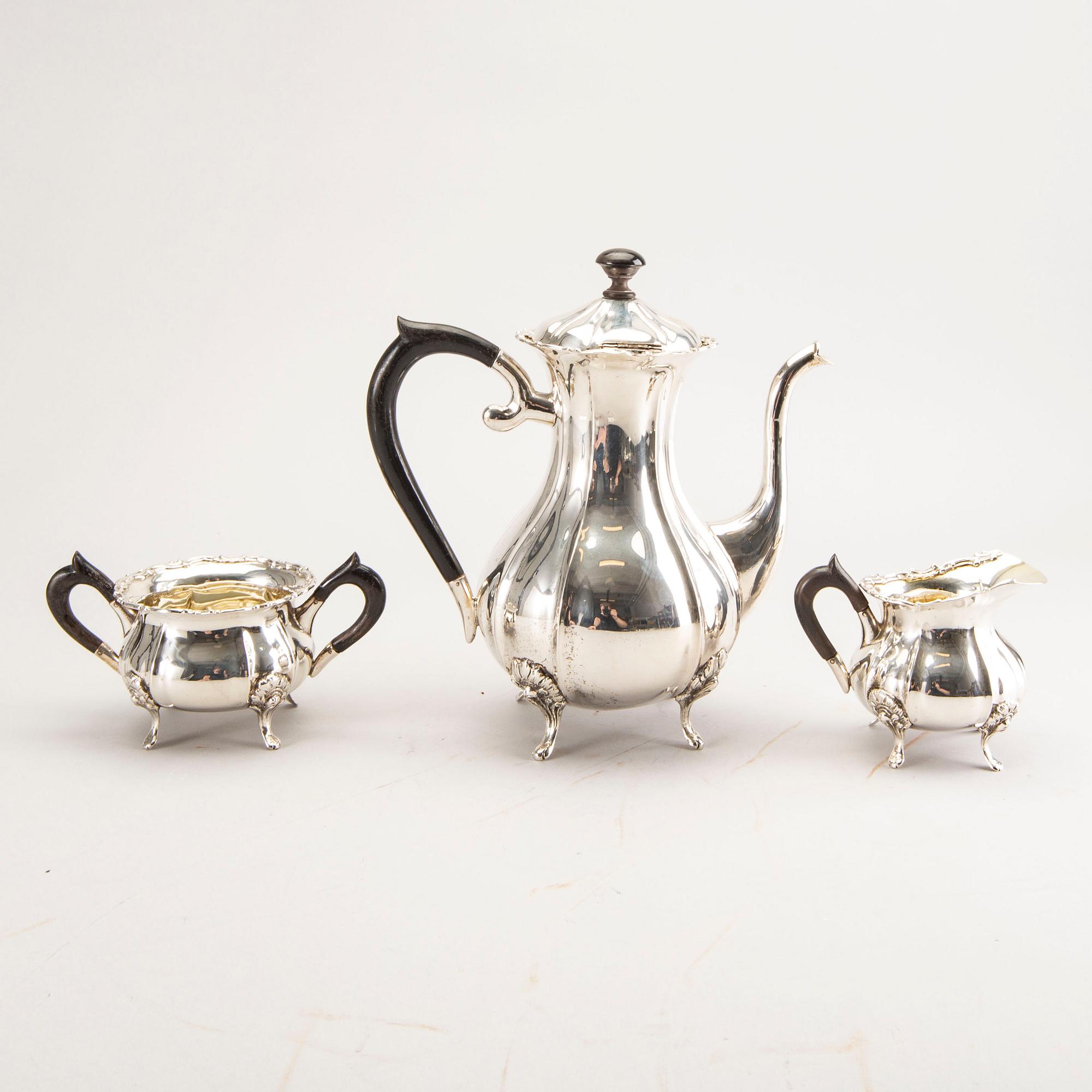 A 20th century German three parts silver tea service with Swedish import stamps.