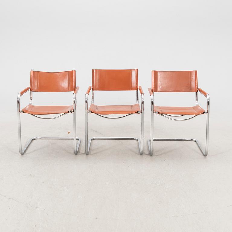 A set of five Italien chrome and leather armchairs alter part of the 20th century.