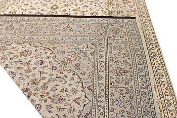 A Kashan carpet, c. 355 x 242 cm.