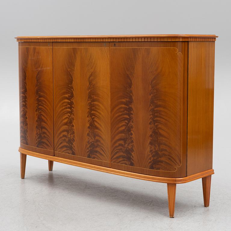A cabinet, mid-20th Century.