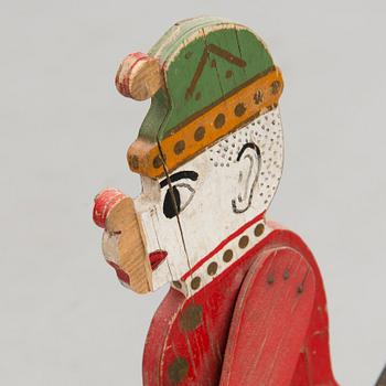 A painted wooden toy from the first half of the 20th Cnetury.