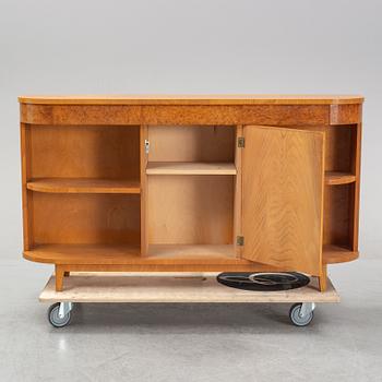 A Swedish Modern elmwood veneered bookcase, 1930's/40's.