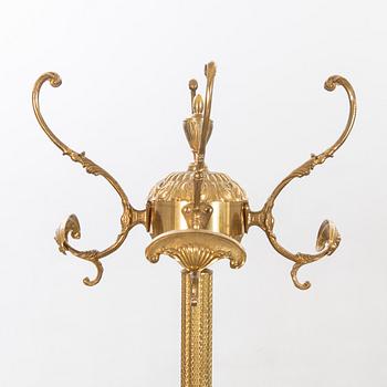 A brass coat hanger alter part of the 20th century.