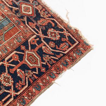 An antique Heriz carpet, ca 350 x 317 cm.