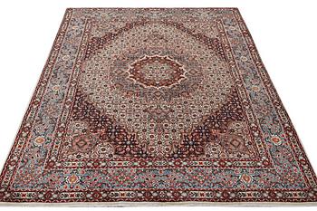 An Oriental carpet, c. 295 x 214 cm.