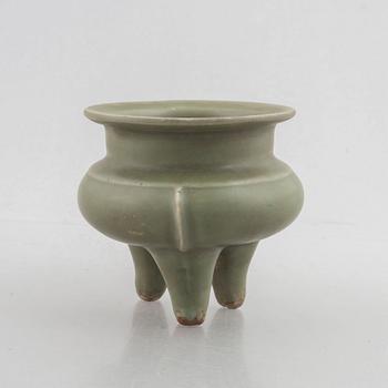 A Chinese celadon tripod censer, late Ming dynasty, for the Southeastern market.