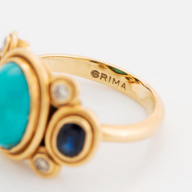 Grima ring 18K guld med turkos, safirer och runda briljantslipade diamanter.
