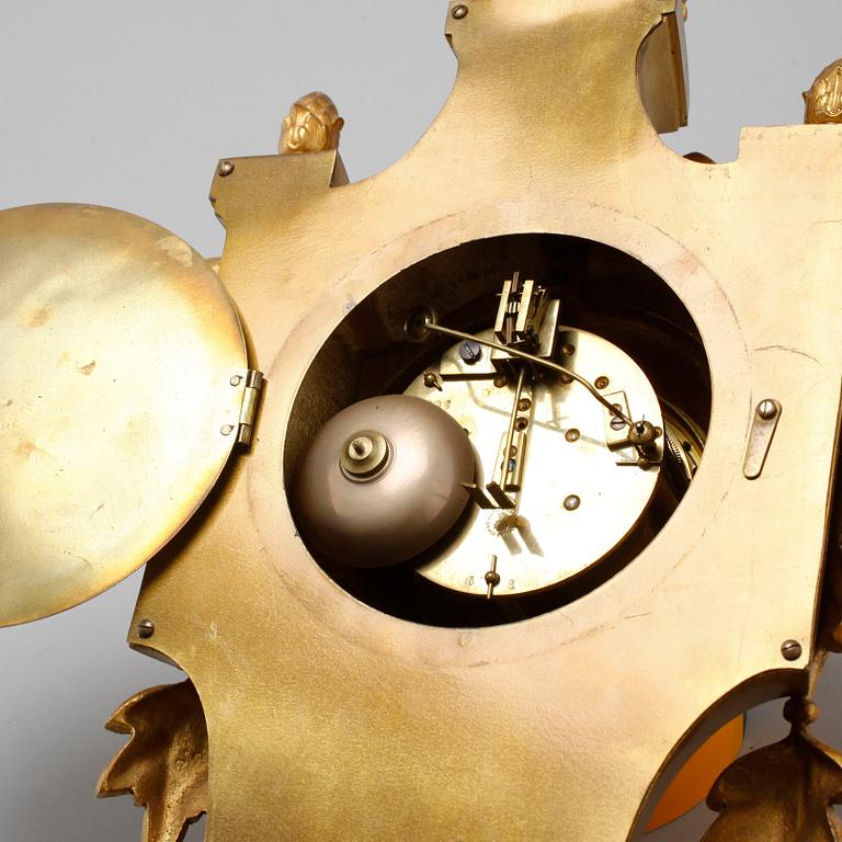 A wall clock in Louis XVI style with clockwork by Japy Frères & Cie, made around year 1900.