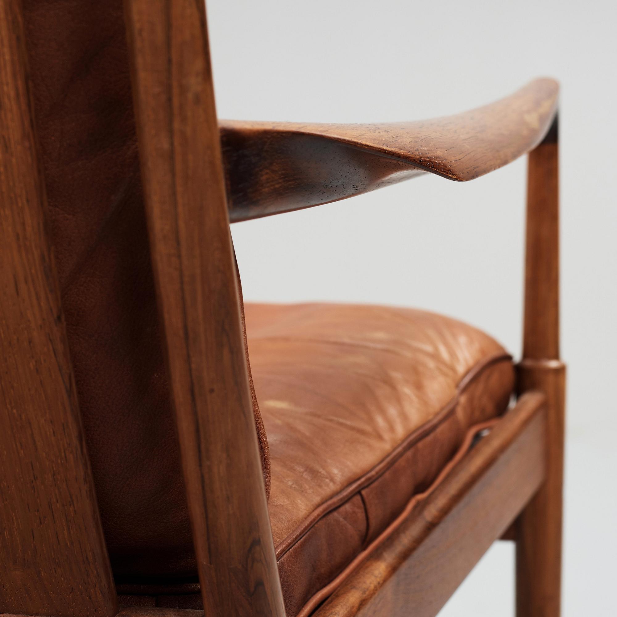 Ib Kofod-Larsen, a pair of "Samsö" palisander and brown leather easy chairs, Olof Persons Fåtöljindustri (OPE) Sweden 1960's.