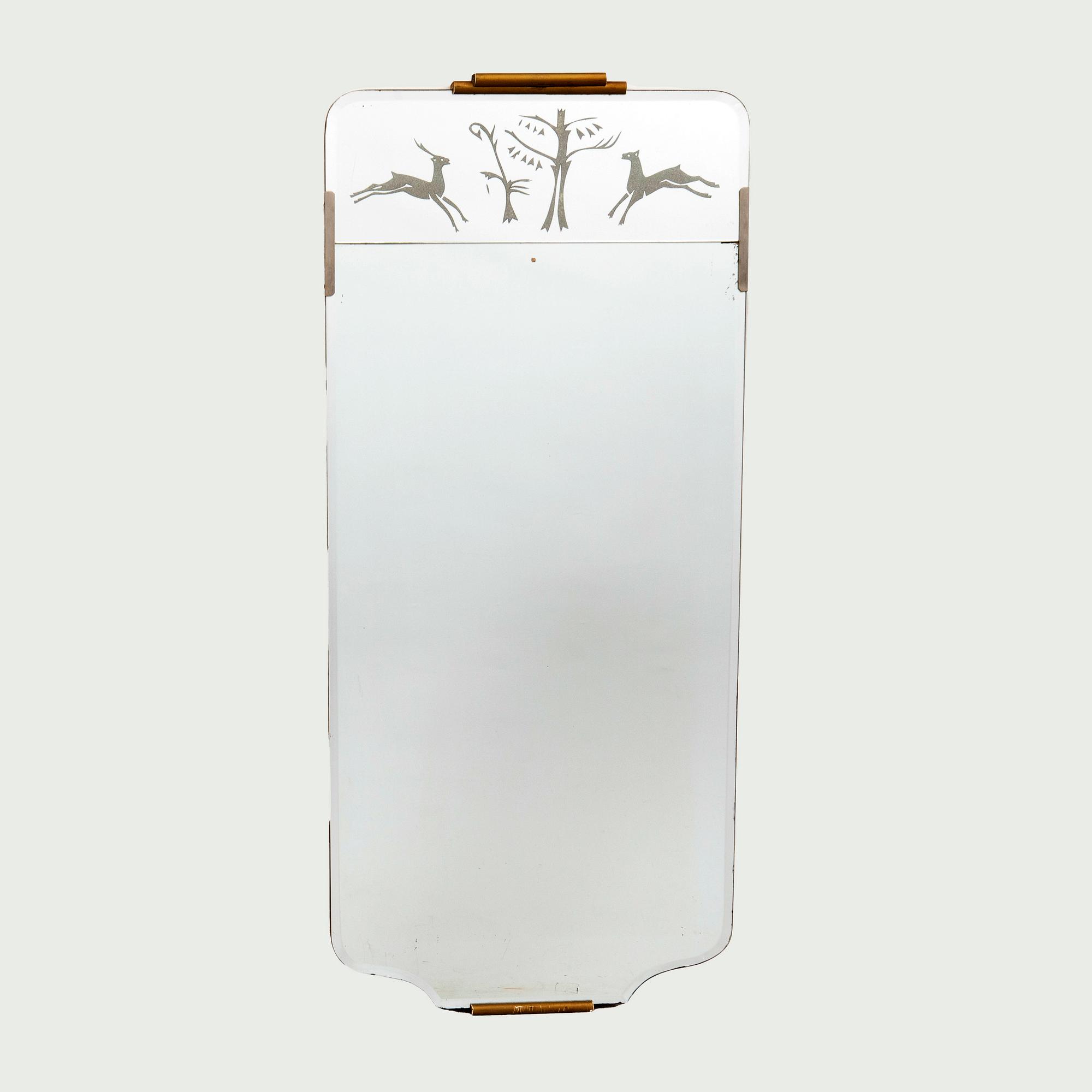 A 1940s Swedish Modern mirror.