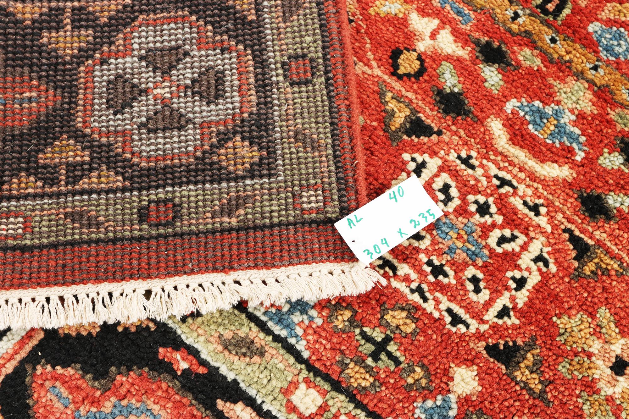 A Mamluk design carpet, c. 304 x 235 cm.