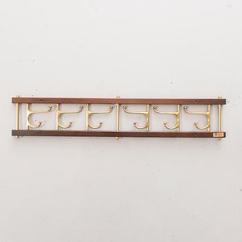 Klädhängare, "Dekorativ", AB Skogslunds metallgjuteri, Anderstorp, 1900-talets mitt.