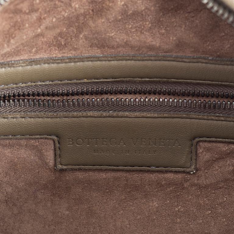 Bottega Veneta, a grey intrecciato leather bag.