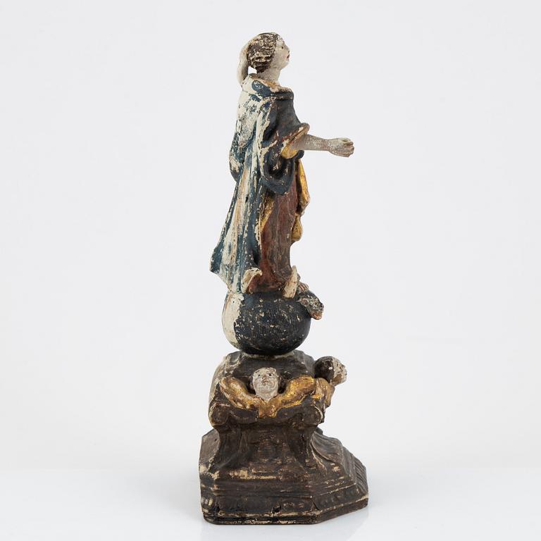 A carved and painted figure of the Virgin Mary crushing the Serpent, Southern Europe, 18th/19th century.
