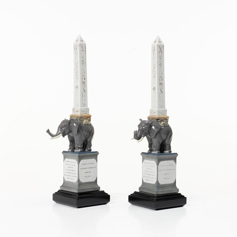 Lladró, figurines, a pair, "Pulcini obelisk enamels left" and "Pulcini obelisk enamels right", Spain.