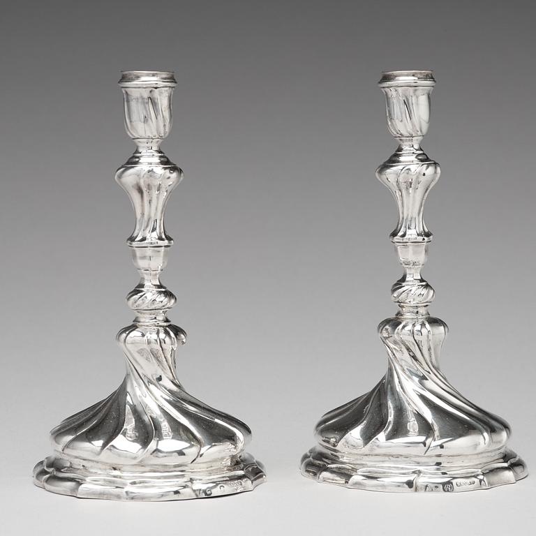 A pair of Swedish 18th century silver candlesticks, mark of Isak Sauer, Stockholm 1755.