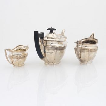 Barker Brothers (Herbert Edward Barker & Frank Ernest Barker), a silver teapot, creamer and sugar bowl, Chester 1924.