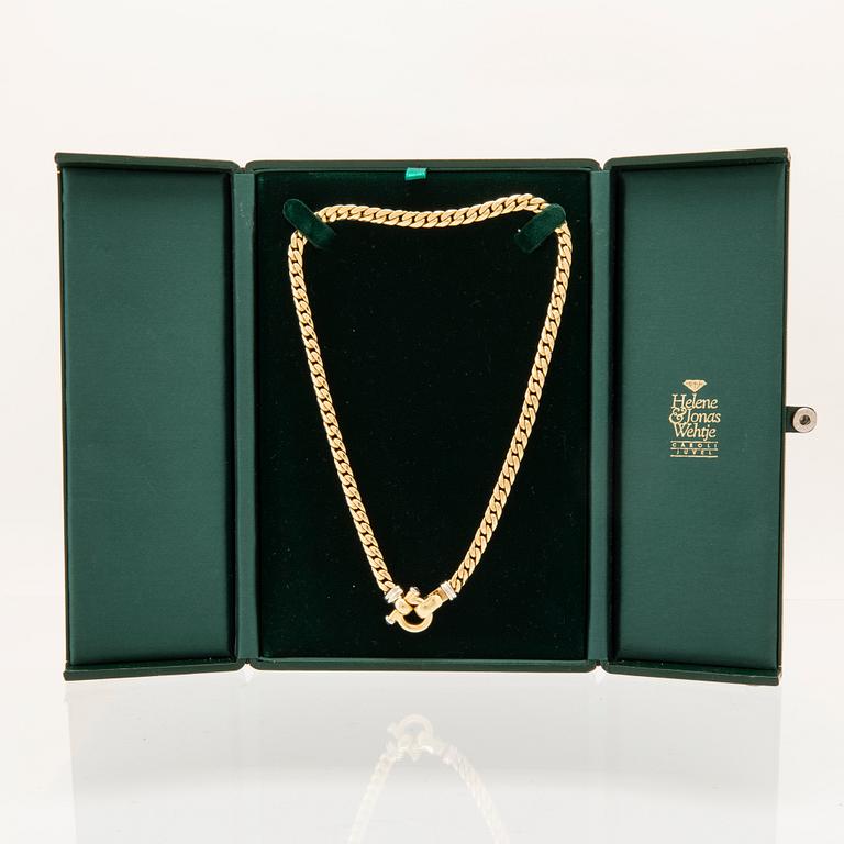 An 18K white and yellow gold necklace set with two cabochon-cut sapphires Italy 1980s.