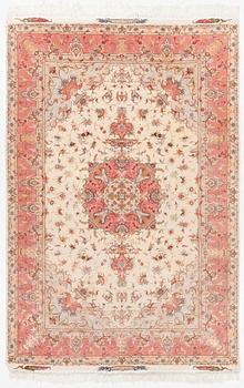 Rug, Tabriz, approx. 305 x 203 cm.
