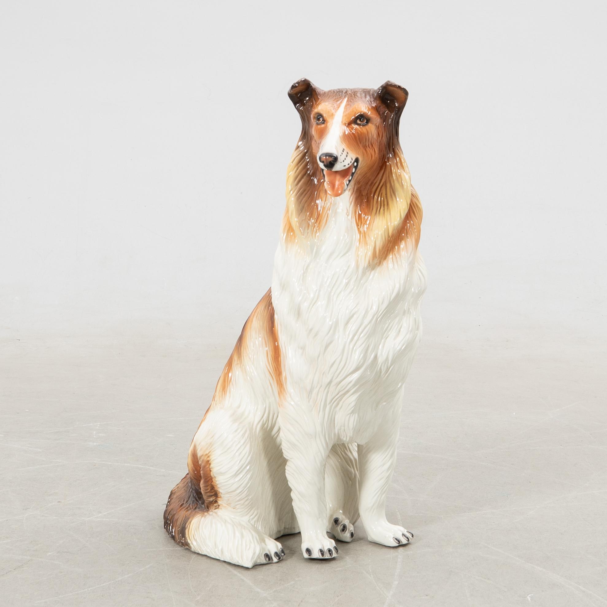 Decorative sculpture late 20th century/21st century Sitting dog.