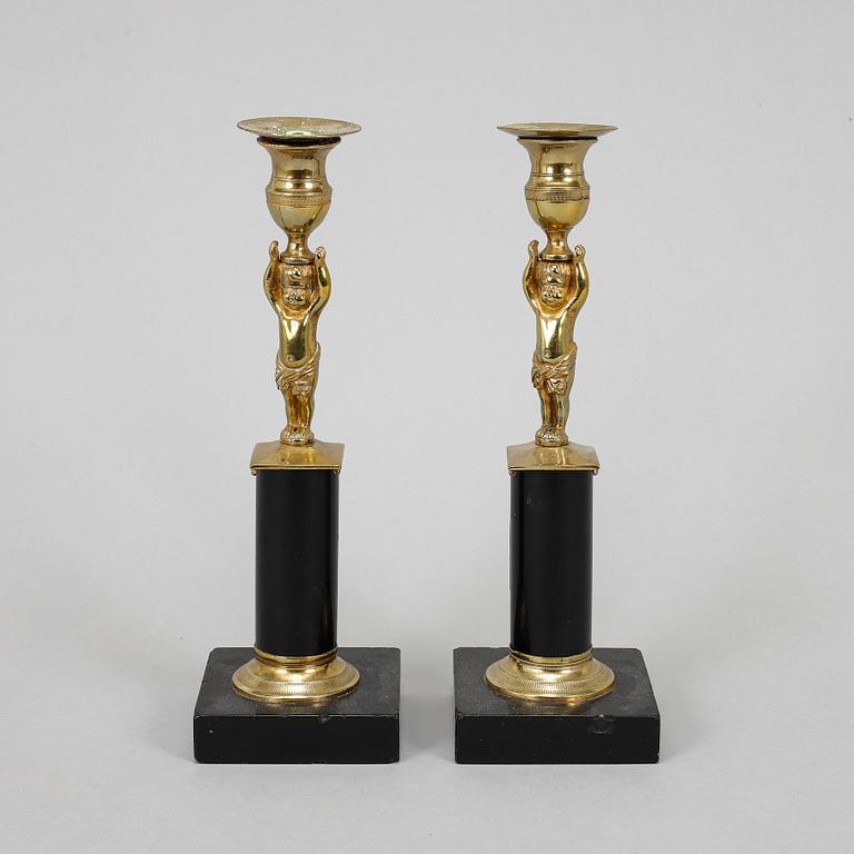 A pair of late gustavian candlesticks, circa 1800.