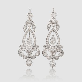 1163. A pair of old-cut diamond earrings. Total carat weight circa 9.70 cts.
