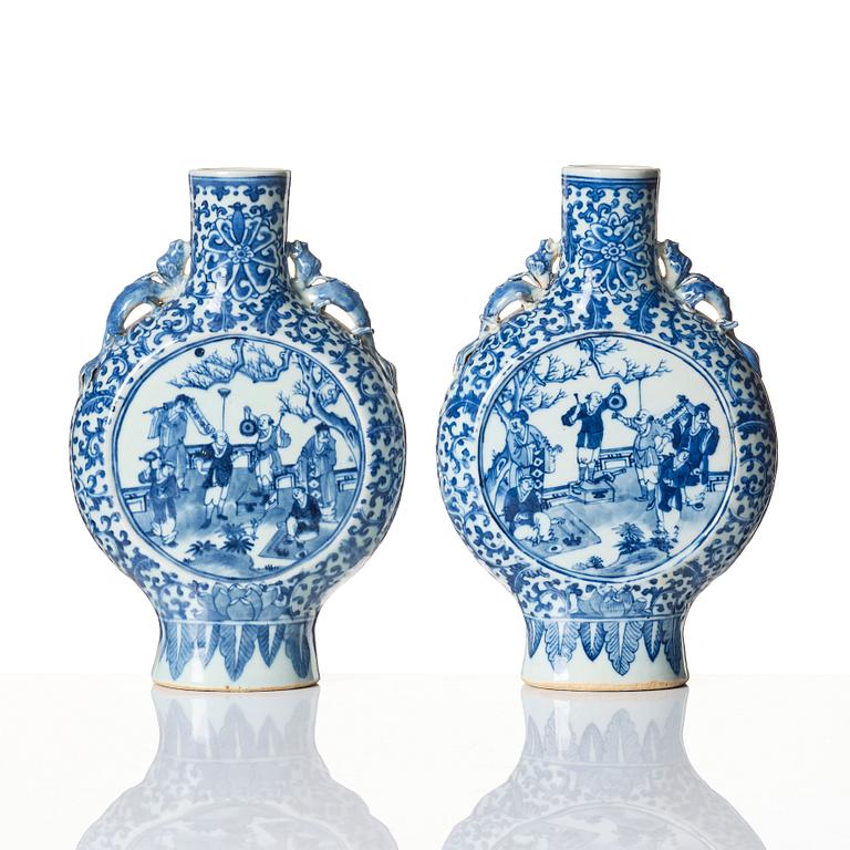 A pair of blue and white moon flasks, Qing dynasty, 19th Century.