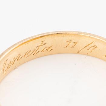 Ring 18K guld med en rund briljantslipad diamant 0.15 ct enligt gravyr.