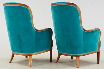 FÅTÖLJER, 2 st, "Advokaten", brännmärkta Carl Malmsten, 1900-talets andra hälft.