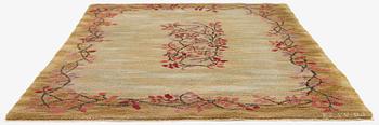 A knotted pile carpet, c. 275 x 177 cm, signed ES-FV-AJ.