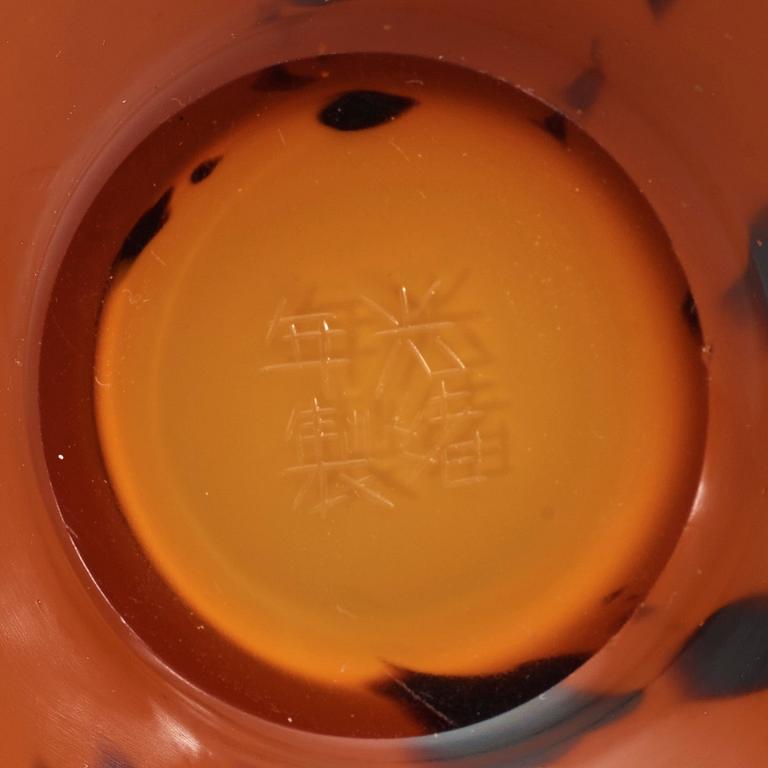 A brown spotted amber coloured peking glass vase, late Qing Dynasty (1644-1912), with a Guangxu four character mark.