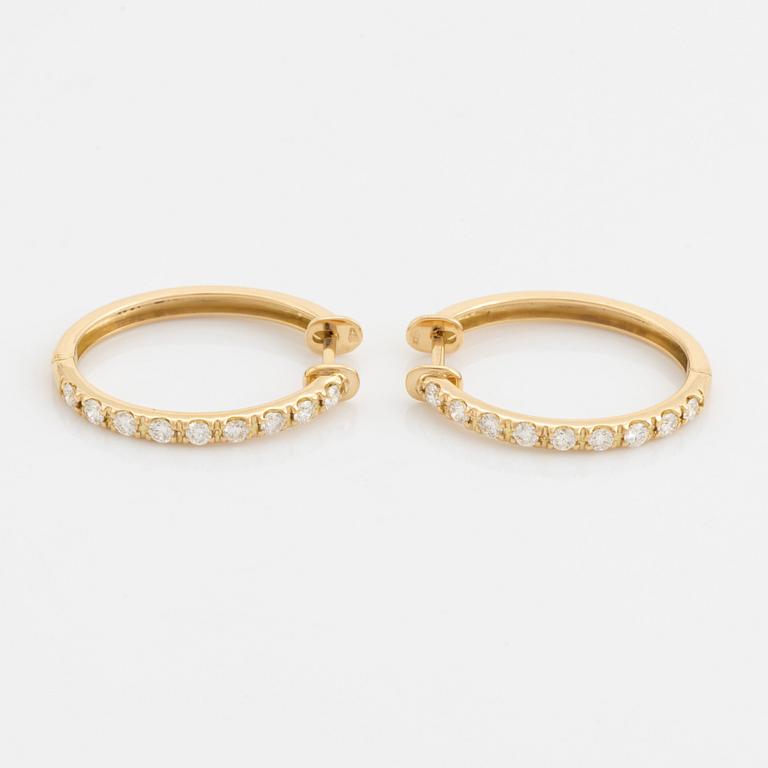 Brilliant cut diamond hoop earrings.
