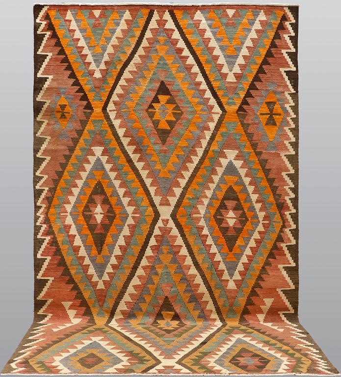 A kurdish kilim carpet, ca 310 x 173 cm.