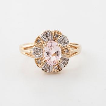 A morganite and brilliant cut diamond ring.