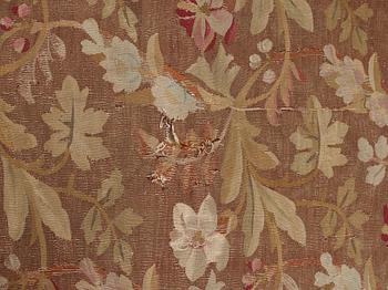 A CARPET, tapestry weave, ca 415,5-419 x 392-396 cm, Aubusson, France, the age of Louis Philippe, around 1840.