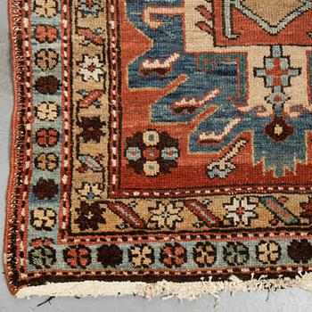 A Heriz runner, ca 310 x 85 cm.