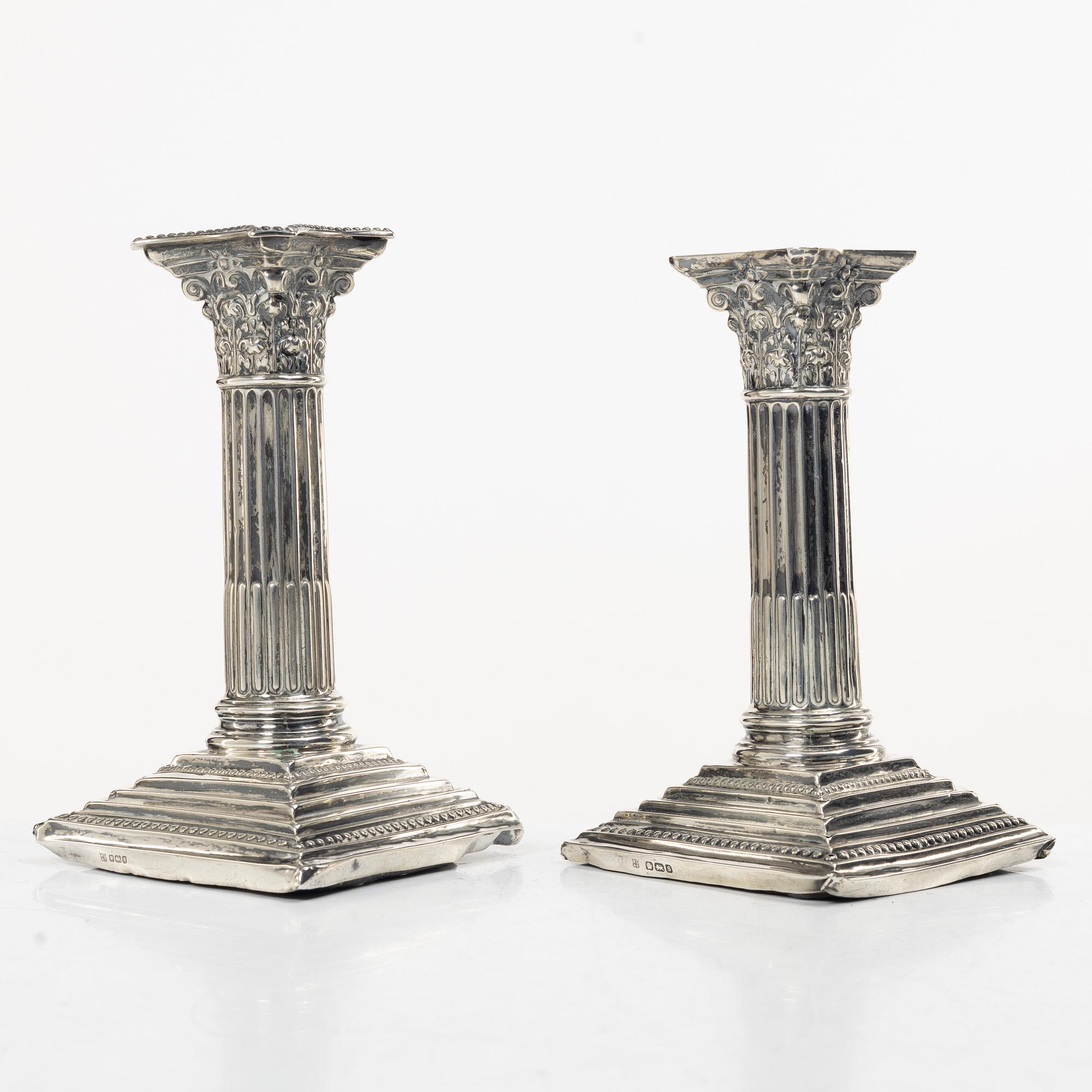 A pair of English silver column candlesticks, mark of Walter Latham & Son, Sheffield, 1910.